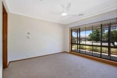 7 Lachlan Court West Wodonga VIC 3690 $399,000 Located in a West Wodonga Court close to Sporting facilities, Shopping Centre and Wodonga TAFE/La Trobe University, this is great family home. Offering 4 Bedrooms, the master at the front of the property has an ensuite and walk-in robe, the three remaining bedrooms are at the back of the property with access through to another bedroom or living room. Good size living area with the main lounge at the front and an open plan kitchen dining. The Outside offers an allotment of 858m2, double carport with access through to the backyard for a shed. With Some renovations and updating this could be your forever home. Ring today for an inspection! FEATURES: • Air Conditioning • Built-In Wardrobes • Close To Schools • Close To Shops • Close To Transport • Garden..