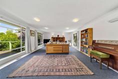 46 Holman Street Curtin ACT 2605 Within walking distance of three preschools, two primary schools, a high school, a college, (10 mins drive to the Grammar Schools) thriving local shops and the Woden retail and office precinct, this four-bedroom home is poised to make your family life so much easier. Enviably positioned at the apex of a broad expanse of parkland (The Yarra Glen Reserve) a welcoming front deck gives you views over the manicured front garden to the open green space across the street. Inside, the open-plan living and dining area has dual aspect to both the front and rear gardens, and offers access to a second, rear deck. The adjacent kitchen boasts a breakfast bar and ample storage that will hold all the supplies you need to keep your tribe fed. There's a large family bathroom with spa* bath plus a second separate toilet. All four bedrooms have built-in wardrobes and appealing outlooks. If you want to get some work done, or need downtime, you can head out to the home office in the backyard. It has a separate entrance and patio area. This is a versatile home on a large block and offers comfortable living for your family now, but scope for renovating down the track. Something of a renaissance suburb, Curtin celebrated its 50 th birthday in 2014 and is well-regarded for its pedestrian-friendly layout, shops such as farmers' outlet Choku Bai Jo, and dining options including My Gourmet Delights, Redbrick Espresso, Curtin Bakery, award-winning Indian restaurant Daana and the Statesman Hotel's H2O Restaurant and Bistro. ** PLEASE NOTE THIS PROPERTY WILL GO TO AUCTION ON SITE ON SATURDAY, 13TH FEBRUARY AT 10:00AM ** FEATURES: * four-bedroom brick home on a large block opposite parkland * all bedrooms with built-in wardrobes * large family bathroom with separate shower plus spa bath * second, separate toilet * expansive and bright open-plan living and dining area with views to both the front and rear landscaped gardens * internal access to front and rear timber decks * kitchen with breakfast bar and ample storage * laundry with external access to dedicated and concealed hills hoist * separate home office/studio with its own entrance and patio area * large storage shed * manicured front and rear gardens * parking for three cars with garage plus carport * easy walking to schools and public transport,.