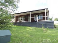 37 Ryan Street Talbingo NSW 2720 $320,000 Nicely presented cedar clad cottage consisting of two bedrooms plus sleep out, good sized lounge room with separate dining room, there is a full length front verandah north facing offering lovely views of the mountains. The cottage is set on an extra large block with lock up garage and concrete drive way.