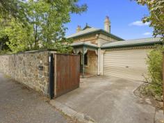 17 Nottage Terrace MEDINDIE SA 5081 $980,000 Nestled behind a beautiful stone wall, and enjoying the acoustic benefits of a combination of bluestone construction and double glazed windows, this wonderful character home offers the new owners the opportunity to secure a prestigious Medindie address with the freedom to adapt the property to their own unique requirements. The front four rooms of the main house are currently utilised as two beautiful bedrooms and a formal lounge with adjoining study. The existing layout lends itself to the possibility to enjoy the front room as a wonderful master bedroom with adjoining dressing room or even the perfect space for the addition of an ensuite bathroom. Continuing further through the property, the spacious kitchen is filled with beautiful natural light thanks to the cleverly located skylights. The central island and large wrap around bench tops allow for plenty of preparation space for even the most adventurous chef and the adjoining dining room offers the perfect space for entertaining a large collection of family and friends. The open lounge at the back of the house overlooks the private leafy garden and wraps around a spacious bedroom complete with large built-in wardrobes. A generous family bathroom featuring a classic claw foot bath and separate shower together with a European style laundry complete the footprint of the main residence. The detached two storey coach house is the surprising secret ingredient in this magical piece of Medindie. Downstairs, the open plan living and dining areas are complemented by a galley style kitchen together with a neat bathroom. Traveling up the intriguing spiral staircase the bedroom features a striking cathedral ceiling and beautiful polished timber floor. Currently utilised as rented guest accommodation, this amazing space will appeal to those looking to accommodate a large family or someone searching for a spacious home office or unique creative space. Key features include: • Stone fronted character villa • Flexible floor plan with eight rooms in the main residence • Two storey detached coach house with kitchenette & bathroom • Outside storage room or perfect workshop • Ducted reverse cycle air conditioning • Character fireplaces and polished timber floors • Natural stone wall & remote gate access • Two car carport • Low maintenance gardens with pretty rotunda • Easy walking distance to the parklands and North Adelaide • Close to Wilderness & St Andrews schools • Zoned to Walkerville & North Adelaide Primary Schools • Zoned to Adelaide & Adelaide Botanic High Schools..
