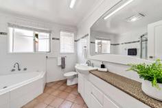 46 Holman Street Curtin ACT 2605 Within walking distance of three preschools, two primary schools, a high school, a college, (10 mins drive to the Grammar Schools) thriving local shops and the Woden retail and office precinct, this four-bedroom home is poised to make your family life so much easier. Enviably positioned at the apex of a broad expanse of parkland (The Yarra Glen Reserve) a welcoming front deck gives you views over the manicured front garden to the open green space across the street. Inside, the open-plan living and dining area has dual aspect to both the front and rear gardens, and offers access to a second, rear deck. The adjacent kitchen boasts a breakfast bar and ample storage that will hold all the supplies you need to keep your tribe fed. There's a large family bathroom with spa* bath plus a second separate toilet. All four bedrooms have built-in wardrobes and appealing outlooks. If you want to get some work done, or need downtime, you can head out to the home office in the backyard. It has a separate entrance and patio area. This is a versatile home on a large block and offers comfortable living for your family now, but scope for renovating down the track. Something of a renaissance suburb, Curtin celebrated its 50 th birthday in 2014 and is well-regarded for its pedestrian-friendly layout, shops such as farmers' outlet Choku Bai Jo, and dining options including My Gourmet Delights, Redbrick Espresso, Curtin Bakery, award-winning Indian restaurant Daana and the Statesman Hotel's H2O Restaurant and Bistro. ** PLEASE NOTE THIS PROPERTY WILL GO TO AUCTION ON SITE ON SATURDAY, 13TH FEBRUARY AT 10:00AM ** FEATURES: * four-bedroom brick home on a large block opposite parkland * all bedrooms with built-in wardrobes * large family bathroom with separate shower plus spa bath * second, separate toilet * expansive and bright open-plan living and dining area with views to both the front and rear landscaped gardens * internal access to front and rear timber decks * kitchen with breakfast bar and ample storage * laundry with external access to dedicated and concealed hills hoist * separate home office/studio with its own entrance and patio area * large storage shed * manicured front and rear gardens * parking for three cars with garage plus carport * easy walking to schools and public transport,.
