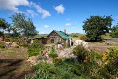 2 Parkham Rd Elizabeth Town TAS 7304 $439,000 Location Location Location – you won’t find many better than this renovated massive home on approximately 1/2 an acre (.2 hectares) that has multiple opportunities for usage due to size, configuration and Location Location Location ! Ideally situated on a corner block right on the famous Cradle to Coast Tasting Trail with stunning uninterrupted 360 degree views of the Tasmanian countryside and bushland, this almost completely renovated and updated in last 4 years- from top to bottom home. Five bedrooms (2 are considered Master-one with ensuite and study area, and one with dividing wall which has a walk in robe, dressing room and study area on other side ) and 2 others also have BIR’s. Want more ? No problem- 2 bathrooms, dedicated study/office with built in bed, massive undercover sunroom/entertaining area with brand new decking, 2 carports, 2 long private driveway entrances from both the Bass Highway and Parkham Rd with multiple ‘designated’ parking areas available and plenty of room to build at least one other 4 vehicle carport or garage or massive shed STCA where the land has recently been leveled and already graveled for you at back of home, 2 brand new 22,000 ltr water tanks, 3 reverse cycle air cons for both heating and cooling, established gardens with considerable space to re-establish lawns (front yard has very recently been excavated and leveled), put in a chicken shed or a large vegie garden. Ask the agent about the secret room/storage area upstairs with the entry through door at back of the built in wardrobe-who wouldn’t like their very own Narnia ! Still want more ? No problem-STCA, and with a few minor alterations, you could use one side of this home as an AirBNB or private rental as there is a hallway that effectively makes one side of this massive home a separate wing, live in main part of home and rent the other part, or may be ideal for a share home, family wanting to accommodate older relatives in separate wing whilst still being close by-so many viable options limited only by the imagination! Situated on the famous Cradle to Coast Tasting Trail that has maximum exposure to both locals and passing trade, and with the added bonus of an easy commute to either Launceston or Devonport and only 8-10 minutes to Deloraine, STCA you could set up a business or work from home in at least 3 different study/office areas.