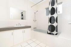 2/14 Links Road Marrara NT 0812 $330,000 Investors start your property empire with this solid entry-level villa, or owner/occupiers secure low-maintenance ground-floor living for excellent value with this two-bedroom home. The boutique complex backs onto Darwin Golf Course in a quiet cul-de-sac setting, and there's plenty of capital growth potential in this convenient central location with schools, sporting facilities, shopping centres and the city all within easy reach. Generous open-plan living/dining area with dual sliding doors into private courtyard Modern kitchen with a breakfast bar, built-in s/steel wall oven and dishwasher recess Covered and paved integrated alfresco patio in no-maintenance rear courtyard Both bedrooms feature updated modern built-in robes and large picture windows Well-presented main bathroom with shower over bath, built-in vanity and separate toilet Large, well-equipped laundry with outdoor access and plenty of storage space Built-in linen cupboard off main bathroom provides additional storage space Low-maintenance floor tiles to living and wet areas; carpet to both bedrooms Split-system air conditioning and ceiling fans throughout ensure your comfort Parking provided with a carport plus car space at front, in low-rise golf course complex - Large pool in complex to cool off in after your round of golf! There's no work to do in this spotless ground-floor villa just move straight in or get it on the rental market without delay. Enter via the single carport and directly into the main living/dining space that captures abundant natural light and is presented in neutral contemporary tones to suit your personal interior design style. Two sliding glass doors provide good flow onto the large covered patio in the generous rear courtyard that requires next to no maintenance. The good-sized modern kitchen adjoins the main living space with a breakfast bar, and both generous bedrooms join the main bathroom at rear. There are quality modern built-in robes to both generous carpeted bedrooms, and there is a shower over bath plus a large built-in vanity and separate toilet to the spotless main bathroom. A fully enclosed laundry off the carport with access to the rear courtyard completes the package. Put this quality villa on your shortlist and organise your inspection! Vacant possession Year Built: 1992 approximately Body Corporate: $775 per quarter approximately Council Rates: $1500 per year approximately FEATURES: • Air Conditioning • Built-In Wardrobes • Close To Schools • Close To Shops • Close To Transport