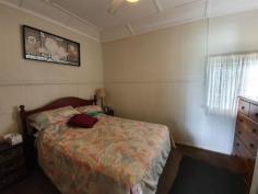 10 Fern St Blackbutt QLD 4306 $259,000 This 2 bedroom home has built in wardrobes, air conditioning in the main bedroom and both rooms have ceiling fans. There is also a sleep-out/entrance at the front of the home that could be converted to a 3rd bedroom. Lounge room is a good size with beautiful polished timber floors, a slow combustion wood fire and a glass sliding door opening out to a full length verandah down one side of the house. Kitchen features a gas stove top with electric oven and dishwasher. A large patio area at the rear of the home is the perfect place to entertain or sit back and enjoy the beautiful established gardens. Concreted and partly enclosed carport could accommodate 2 cars and if needed a trailer, large covered veggie garden, chook pen, rainwater tanks, garden shed, fully fenced and 21 new solar panels. Walking distance to school, doctors and shops. Book an inspection today.