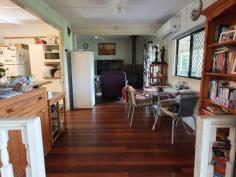 10 Fern St Blackbutt QLD 4306 $259,000 This 2 bedroom home has built in wardrobes, air conditioning in the main bedroom and both rooms have ceiling fans. There is also a sleep-out/entrance at the front of the home that could be converted to a 3rd bedroom. Lounge room is a good size with beautiful polished timber floors, a slow combustion wood fire and a glass sliding door opening out to a full length verandah down one side of the house. Kitchen features a gas stove top with electric oven and dishwasher. A large patio area at the rear of the home is the perfect place to entertain or sit back and enjoy the beautiful established gardens. Concreted and partly enclosed carport could accommodate 2 cars and if needed a trailer, large covered veggie garden, chook pen, rainwater tanks, garden shed, fully fenced and 21 new solar panels. Walking distance to school, doctors and shops. Book an inspection today.