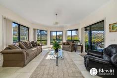 28 Beacon Place Googong NSW 2620 $2,100,000 With commanding 360-degree views from the top of the hill sits this grand residence sprawling over 557.1m2 under one roof line. There is an additional 113.7m2 of verandahs plus covered entertaining areas as well as garaging. The property has surveillance cameras, electric gate and intercom. Through the gate you are lead up the long tree and light-lined sealed driveway to the grand home. The home consists of a large formal lounge and dining room at the front that leads you to a stunning open plan kitchen and family meals area which overlooks the rear entertaining areas and gardens. The kitchen is an entertainer’s dream offering endless stone benches and storage. There is also a walk-in pantry that is large enough to get lost in. Down the extra wide hallway, you will find the massive rumpus/media room. This home offers a parent’s retreat like no other the size of which needs to be seen to be believed. This walk-in robe is fashionista’s dream and the large resort style ensuite offers spa, large shower, separate toilet and heated floors. The remaining 3 spacious bedrooms all offer built-in robes. This home offers two studies, the main study boasts its own entrance and is large enough to be split into 2 additional bedrooms. The second study is located at the opposite end of the home, providing flexible study/work from home options. There is a large three-way main bathroom which services the three bedrooms. Adjacent to this area is the functional and spacious laundry. At the garage end of the home there is a powder room. The oversized 3 car garage provides excellent storage and workshop space along with remote roller doors and internal access. There is also an oversized double garage perfect for any additional machinery. The fully fenced house yard is irrigated, landscaped and offers large level lawn areas along with easy care and established gardens including vegetable beds and fruit trees. There are front and rear covered entertaining spaces which overlook gardens and a stunning vista. The remainder of the property has been divided into paddocks with water troughs and shelter for stock. The current owners run Alpacas on the property. Features: – Grand formal lounge and dining room – Stunning open plan kitchen and family room – Large rumpus/media room – Retreat style master bedroom with walk-in robe and ensuite – Remaining bedrooms all spacious in size with built-in robes – Large home office offering its own entrance – Picturesque views from every room – Additional study at garage end of residence – 2.9m ceilings throughout – Double glazed windows throughout – Ducted reverse cycle air conditioning with 6 zones – Large covered entertaining spaces either side of the home – Oversized 3 car garage attached to house – Additional 2 car garage, 6m x 7m – Double carport attached to house – 110,000ltr concrete rainwater tank – Additional large water tank attached to shed – 500kl per annum bore water supply – 3 phase power to home – 240v power to front gate with driveway lights – 40+ solar panels – Sealed driveway – Automated irrigation system to gardens and lawns – 557.1m2 of house plus 113.7m2 of verandas 670.8m2 total covered – 2.41 Hectares (5.9 acres)