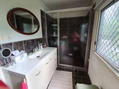 10 Fern St Blackbutt QLD 4306 $259,000 This 2 bedroom home has built in wardrobes, air conditioning in the main bedroom and both rooms have ceiling fans. There is also a sleep-out/entrance at the front of the home that could be converted to a 3rd bedroom. Lounge room is a good size with beautiful polished timber floors, a slow combustion wood fire and a glass sliding door opening out to a full length verandah down one side of the house. Kitchen features a gas stove top with electric oven and dishwasher. A large patio area at the rear of the home is the perfect place to entertain or sit back and enjoy the beautiful established gardens. Concreted and partly enclosed carport could accommodate 2 cars and if needed a trailer, large covered veggie garden, chook pen, rainwater tanks, garden shed, fully fenced and 21 new solar panels. Walking distance to school, doctors and shops. Book an inspection today.