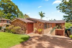 16 Parkes Street Helensburgh NSW 2508 Capturing tranquil bush views this magnificent brick residence is sure to delight families seeking space and tranquillity. The home is set on a 680m2 parcel in a popular location, close to parklands and train station. Move right in and enjoy a versatile layout with a choice of light filled living options, modern bathrooms and kitchen and a covered entertaining balcony, overlooking the low maintenance, child friendly yard and sparkling pool. Currently featuring five bedrooms, all with BIRs, the master with walk through robe and ensuite. The lower level boasts a spacious family room and additional toilet with glass doors allowing seamless access to yet another alfresco area. Add to this drive through garaging, car port and ample storage - to truly appreciate this exceptional property an inspection is a must! ** Whilst every effort has been made to ensure the accuracy and thoroughness of the information provided to you in our marketing material, we cannot guarantee the accuracy of the information provided by our vendors, and as such, Ray White Helensburgh makes no statement, representation or warranty, and assumes no legal liability in relation to the accuracy of the information provided. Interested parties should conduct their own due diligence in relation to each property they are considering purchasing. All photographs, maps and images are representative only, for marketing purposes. FEATURES: • Above Ground Pool • Air Conditioning • Built-In Wardrobes • Polished Timber Floor • Secure Parking • Terrace/Balcony..