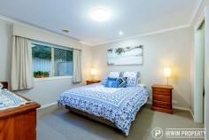12 Bywaters Street Amaroo ACT 2914 This immaculate and spacious family home, set in an ideal, family friendly location, offers a long list of features making it a must-see property for many home buyers. THE HOME A manicured front lawn and gorgeous Crepe Myrtle trees offer an inviting welcome, hinting that you're inspecting something special. The formal tiled entry leads into a large formal living space comprising of a dining area and lounge area. The space offers flexibility, ability to be closed off from the rest of the house and lovely natural light from the north. The heart of the home consists of the kitchen and an open plan family/meals area that opens onto the pergola area and the rear yard via sliding doors. This is a great space, sure to be the centre of family life. Extra height ceilings run through the living and kitchen areas. The large kitchen offers ample bench space including breakfast bar, generous storage (great pantry) and updated quality appliances, including a 5-burner gas cooktop plus a Westinghouse oven and dishwasher. The master bedroom is a spacious size and features a large walk-through wardrobe with some clever storage ideas and a nicely set out ensuite bathroom. There are three additional bedrooms, all well sized and featuring built-in wardrobes. The main bathroom features a corner spa bath and a separate toilet. The level, rear garden features an alfresco/pergola area, low maintenance gardens, brand new turf and a handy garden shed. Additional features include ducted gas heating and evaporative cooling, split system air-conditioner to the family room, Rinnai continuous flow gas hot water, plus energy efficient curtains and pelmets. The double garage benefits from internal access, a power door opener and a generously sized driveway allowing for plenty of off-street parking. There's also drive through access to the rear yard giving the option to use the garage as an additional outdoor entrainment area. THE LOCATION Positioned on a quiet street opposite green reserve, the block offers an ideal northern orientation. Within a walkable 1.2km is Yerrabi Pond, a lovely spot for an evening stroll, enjoying the surrounding parks and feeding the ducks. The Yerrabi waterfront also features a number of businesses including restaurants and a hair salon. Within just 1.5km, there's Amaroo School, Good Shepherd Catholic Primary School and the very popular Amaroo shops featuring a Coles & Aldi supermarket. Only 2.4km away, the Gungahlin CBD offers a vast array of shopping outlets, schools, gyms, medical facilities, restaurants, cafés and a light rail station..