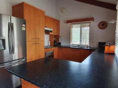 595 BROOKLANDS ROAD NANANGO QLD 4615 $335,000 Well presented property situated only 4 minutes from Nanango. Featuring cathedral ceilings with exposed timber beams, open plan kitchen with electric cook-top and oven with generous cupboard and bench space. There are 2 main bedrooms both with air conditioning and 1 has built in wardrobe. The 3rd bedroom is in a separate living quarters linked via a deck making it ideal dual living with air conditioned and loads of cupboards for storage. This property has full Security screens installed on all doors and windows, a wrap around veranda to compliment a deck area perfect for entertaining. 2 KW solar system with near new inverter, 6 x 6m shed perfect for a workshop with a 6 x 6 m carport and two 6 x 3m sheds to accommodate cars and caravan. Concrete under ground water tank that holds Approx 40,000 ltrs and a poly tank holding approx. 5,500 ltrs, enclosed vegetable garden, fully fenced 14 acres with dam.