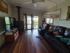 10 Fern St Blackbutt QLD 4306 $259,000 This 2 bedroom home has built in wardrobes, air conditioning in the main bedroom and both rooms have ceiling fans. There is also a sleep-out/entrance at the front of the home that could be converted to a 3rd bedroom. Lounge room is a good size with beautiful polished timber floors, a slow combustion wood fire and a glass sliding door opening out to a full length verandah down one side of the house. Kitchen features a gas stove top with electric oven and dishwasher. A large patio area at the rear of the home is the perfect place to entertain or sit back and enjoy the beautiful established gardens. Concreted and partly enclosed carport could accommodate 2 cars and if needed a trailer, large covered veggie garden, chook pen, rainwater tanks, garden shed, fully fenced and 21 new solar panels. Walking distance to school, doctors and shops. Book an inspection today.