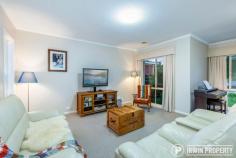 12 Bywaters Street Amaroo ACT 2914 This immaculate and spacious family home, set in an ideal, family friendly location, offers a long list of features making it a must-see property for many home buyers. THE HOME A manicured front lawn and gorgeous Crepe Myrtle trees offer an inviting welcome, hinting that you're inspecting something special. The formal tiled entry leads into a large formal living space comprising of a dining area and lounge area. The space offers flexibility, ability to be closed off from the rest of the house and lovely natural light from the north. The heart of the home consists of the kitchen and an open plan family/meals area that opens onto the pergola area and the rear yard via sliding doors. This is a great space, sure to be the centre of family life. Extra height ceilings run through the living and kitchen areas. The large kitchen offers ample bench space including breakfast bar, generous storage (great pantry) and updated quality appliances, including a 5-burner gas cooktop plus a Westinghouse oven and dishwasher. The master bedroom is a spacious size and features a large walk-through wardrobe with some clever storage ideas and a nicely set out ensuite bathroom. There are three additional bedrooms, all well sized and featuring built-in wardrobes. The main bathroom features a corner spa bath and a separate toilet. The level, rear garden features an alfresco/pergola area, low maintenance gardens, brand new turf and a handy garden shed. Additional features include ducted gas heating and evaporative cooling, split system air-conditioner to the family room, Rinnai continuous flow gas hot water, plus energy efficient curtains and pelmets. The double garage benefits from internal access, a power door opener and a generously sized driveway allowing for plenty of off-street parking. There's also drive through access to the rear yard giving the option to use the garage as an additional outdoor entrainment area. THE LOCATION Positioned on a quiet street opposite green reserve, the block offers an ideal northern orientation. Within a walkable 1.2km is Yerrabi Pond, a lovely spot for an evening stroll, enjoying the surrounding parks and feeding the ducks. The Yerrabi waterfront also features a number of businesses including restaurants and a hair salon. Within just 1.5km, there's Amaroo School, Good Shepherd Catholic Primary School and the very popular Amaroo shops featuring a Coles & Aldi supermarket. Only 2.4km away, the Gungahlin CBD offers a vast array of shopping outlets, schools, gyms, medical facilities, restaurants, cafés and a light rail station..