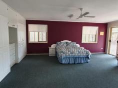 72 Nanango Brooklands Rd Nanango QLD 4615 $359,000 Only 4km from the town of Nanango, this brick home has verandas on three sides, it is a 3 bedroom home with a extra large 3rd Bedroom. Good size lounge/dining room area with a wood heater to keep you warm in the cooler months, also a split system air conditioner. The Kitchen has a electric oven and cook top with range hood, there is a two way bathroom with separate toilet. Ceiling fans through out the home, security screens on windows and doors and plenty of rainwater storage with tanks holding 16,000 Gallons. There is also a separate dwelling with a open plan kitchen/Lounge and dinning area, a large bedroom and a storage area that could be converted to a Bathroom, attached is a large carport and a entertainment/BBQ area. This property has a 10m x 8 m shed with power, with a 2meter awning. Behind the shed is another bay enclosed for storing garden implements and is fitted with a rainwater tank. The acreage is divided into a home yard and the paddock with the dam. Book an inspection Today
