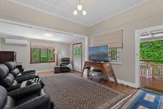 205 Long Street SOUTH TOOWOOMBA QLD 4350 $600,000 This beautifully presented Gable Home on a 1,144m2 block, sets the benchmark for fabulous family living. This generous allotment is fully fenced and absolutely surrounded by mature trees and lush plants offering complete privacy. The timeless features of this home are evident from the moment you step through the Gated-Arbor Entrance , well-crafted to match the residence's traditional elements. Dual staircases lead up to a classic front veranda complete with ornate detailing and balustrades framing the front entrance. Step inside to be greeted by magnificent period features including VJ walls, French doors, breeze ways, soaring ceilings, and polished timber floors. Features: • 4 large bedrooms • Main with ensuite and walk in robe • Modern bathroom with double vanity and dual shower • Spacious formal lounge with French doors to veranda • Open plan kitchen, meals, family room flowing out to north-facing covered rear deck with privacy blinds. Well-appointed kitchen with walk-in pantry • Generous formal dining positioned to seamlessly link for alfresco entertaining • Downstairs rumpus/gym room, plus a utility/mud room, 3rd toilet and loads of storage, plus parking for small car This property has air conditioning, walk-in linen cupboard, natural gas, solar power, insulation, NBN, 3 phase power to house and 6mx6m shed, 6 foot fences, security gate with remote, rear vehicle access to double car port and shed, and is fully fenced (dog proof). This home is superbly located moments to the CBD, within easy walking distance Ruthven Central Shops (cnr Ruthven and Long St), and to the Bernoth Centre and new medical/commercial centre.