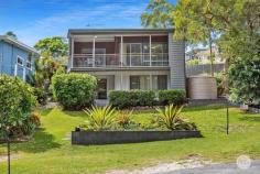 9 Burbong Street NELSON BAY NSW 2315 An exclusive opulent coastal residence, this spectacular four-bedroom, two-bathroom beach masterpiece has been meticulously designed to enjoy all that Nelson Bay has to offer. On the door step of Bagnalls Beach, enveloped by spectacular sunset vistas, the freestanding home has been crafted to take full advantage of panoramic ocean views with the combination of weatherboard, glass and timber to allow the vista to take centre stage. Spread over two levels, the beachy cues from the beachside setting with natural oak flooring and hints of blue, this residence will sure take your breath away. Neutral coloured interiors anchor the home together, whilst plenty of windows harvest endless picturesque settings. Smell the fresh ocean breezes by opening the house up, spend the summer weekends by the water directly across the road or stroll down the pathway to one of Port Stephens most popular beaches 'Dutchmans Beach'. UPSTAIRS: This area of the home has split system air conditioning, ceiling fans, open plan living and dining area which flow seamlessly onto the spacious kitchen. The upstairs area is occupied with two bedrooms and one bathroom, whilst the master suite enjoys sliding doors out onto the balcony which is wrapped in views. DOWNSTAIRS: Downstairs enjoys two bedrooms, one bathroom and additional kitchen, with living area and split system air conditioning. Secure your vehicles, kayaks, jetskis and garden equipment in the double carport and single lock up garage. This is a fantastic opportunity to secure your own piece of paradise in an extremely rare position. Please contact Dane Queenan on 0412 351 819 to arrange your own private appointment or to receive a free information packing including building & pest reports, floor plan, contract and rental appraisals. Whilst all care has been taken preparing this advertisement and the information contained herein has been obtained from sources we believe to be reliable, PRDnationwide does not warrant, represent or guarantee the accuracy, adequacy, or completeness of the information. PRDnationwide accepts no liability for any loss or damage (whether caused by negligence or not) resulting from reliance on this information, and potential purchasers should make their own investigations before purchasing.