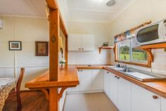 1901 Wisemans Ferry Road Central Mangrove NSW 2250 This centrally located and delightful, RU1 zoned, 40-acre package offers a blend of comfortable accommodation with approximately 15 acres of good gently sloping pasture, multiple dams, and good fencing with rainforest areas, running stream and great potential for further development. The 3-bedroom home is roomy, comfortable, well maintained and presented. Home is air-conditioned with combustion fire. Roof was recently re-sheeted and external walls re-clad. A large covered alfresco area makes outdoor living very comfortable adjacent to a manicured tiered garden and house yard lawns. There are numerous healthy fruit trees. The slab and fireplace of the original home, along with building frame and roof are still located next to the main building and offer the convenience of a potential refurbished second home S.T.C.A. A 4-bay steel shed, 2-bay lockable and 2 open offers substantial storage space. A 22,500-litre concrete tank is provided to receive water from the lower spring fed dam, following some overhaul of the pumping system and several rainwater tanks are holding rainwater from roof collection. Fencing is well thought out and generally in good condition creating several paddocks and a well-defined house yard of approximately 800 sqm. A delightfully landscaped garden and lawns finish off the picture. The property is located just 12 minutes to the M1 and less than 40 minutes to Wahroonga so is on the back doorstep of both Sydney and the many convenient facilities of the beautiful Central Coast.