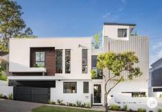 16 Sector St Coorparoo QLD 4151 Influenced by Renaissance Italy's distinctive curved lines and grand spaces, "Florence" as she has come to be known is unlike anything else to grace the Brisbane market. Central to the home is a white spiral feature staircase, that would not be out of place on the pages of an international architectural magazine. A stunning Spanish lift also services all three levels, including the rooftop entertaining terrace with its sweeping green district views. Creating an extraordinary sense of space are three-metre high ceilings throughout, along with a six-metre void soaring above the entry and the poolside alfresco patio. Oversized windows make the most of the living area's perfect northern aspect and leafy backdrop, promising abundant natural light and complete privacy. Every aspect of the home has been finished with unsurpassed quality, sophistication and attention-to-detail, while state of the art-technology enhances the essence of pure luxury. It is a design where aesthetics and functionality exist in perfect harmony. Created with the passionate entertainer in mind, the home boasts an effortless flow between its main indoor and outdoor lifestyle spaces. An exquisite kitchen with curved stone island bench and European appliances is accompanied by integrated bars on both the ground and rooftop levels. Whether it's a quiet Sunday barbeque by the swimming pool, or sunset cocktails overlooking nearby Whites Hill Reserve from the rooftop, there is truly a space for any occasion. Four bedrooms sit privately on the first floor, while an ensuited fifth bedroom (ideal for guests, teenagers or perhaps the ultimate professional home office) is tucked in a quiet corner of the ground floor. Four bathrooms including three private ensuites plus a separate guest powder room service the home. Additional property highlights: -Unique curved feature walls throughout - Open-plan ground living level featuring Bianco porcelain travertine tiling and floor-to-ceiling glass wine wall - Bespoke kitchen with butler's pantry, 40mm feature stone island bench, stone splashback and 2pac soft closing cabinetry -Two 600mm Siemens ovens, integrated SMEG dishwasher, integrated Ilve fridge/freezer, 46 bottle wine storage cabinet - Outdoor entertaining area with integrated stone and 2Pac kitchen/BBQ -Glass-framed saltwater swimming pool and manicured lawns - Rooftop terrace with suspended bar table and 145L fridge - Wine cellar revealing a wine fridge and custom joinery to suit wine and spirits -Bathrooms with Carrara glazed porcelain tiles and brushed nickel tapware - Exquisite guest powder room with a stunning marble-top vanity -Master bedroom with lavish walk-in dressing room and ensuite showcasing stone benchtops with dual vanities, deluxe freestanding bath and double shower - Dakin zoned ducted air-conditioning with izone technology - Smart lighting througout - Intercom system with screens on each level; security system and CCTV external cameras with smartphone control - Laundry featuring Carrara glazed porcelain tiles, stone benchtops and 2pac joinery - Oversized remote double garage with internal and rear access - Exterior paths lined with travertine porcelain tiles -Raised garden beds adorn the façade of the home Sitting in a peaceful, prestigious and elevated position, this superb address is less than 300 metres from the Camp Hill Marketplace cafes, gourmet grocers, Woolworths, and boutiques. Also a short stroll to transport, the Martha Street café/dining precinct, as well as the picturesque parkland and walking trails of Whites Hill Reserve, it is minutes from a selection of elite schools, Westfield Carindale, Coorparoo Square and the CBD just 5km away.