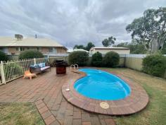 4 Callaille Ave Moree NSW 2400 $420,000 Moree Real Estate is pleased to bring to your attention 4 Callaille Ave, Moree. Set in one of Moree's Premier streets, this neat family home is set behind established hedges giving you great privacy. A well maintained back yard and a pool will be great for entertainment and keeping you cool in summer. Features of the property include. • Currently rented out for $420 (Agreement ends August 2021) • Large brick home located on quiet street • 3 bedrooms with built ins • Neat kitchen with dishwasher & meal area opposite • large lounge room with gas point • bathroom and laundry • large gauzed entertainment area with built in BBQ area • Security shutters • Single garage with rear access • In ground chlorine pool - fenced • Garden shed • Solar panels • Established gardens, hedges and tree's • Rental potential between $450 - $500 in today's market This property is available via inspection only, current tenants require at least 2 days' notice before inspection..