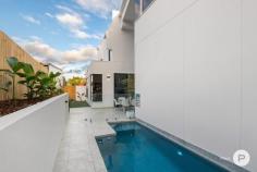 16 Sector St Coorparoo QLD 4151 Influenced by Renaissance Italy's distinctive curved lines and grand spaces, "Florence" as she has come to be known is unlike anything else to grace the Brisbane market. Central to the home is a white spiral feature staircase, that would not be out of place on the pages of an international architectural magazine. A stunning Spanish lift also services all three levels, including the rooftop entertaining terrace with its sweeping green district views. Creating an extraordinary sense of space are three-metre high ceilings throughout, along with a six-metre void soaring above the entry and the poolside alfresco patio. Oversized windows make the most of the living area's perfect northern aspect and leafy backdrop, promising abundant natural light and complete privacy. Every aspect of the home has been finished with unsurpassed quality, sophistication and attention-to-detail, while state of the art-technology enhances the essence of pure luxury. It is a design where aesthetics and functionality exist in perfect harmony. Created with the passionate entertainer in mind, the home boasts an effortless flow between its main indoor and outdoor lifestyle spaces. An exquisite kitchen with curved stone island bench and European appliances is accompanied by integrated bars on both the ground and rooftop levels. Whether it's a quiet Sunday barbeque by the swimming pool, or sunset cocktails overlooking nearby Whites Hill Reserve from the rooftop, there is truly a space for any occasion. Four bedrooms sit privately on the first floor, while an ensuited fifth bedroom (ideal for guests, teenagers or perhaps the ultimate professional home office) is tucked in a quiet corner of the ground floor. Four bathrooms including three private ensuites plus a separate guest powder room service the home. Additional property highlights: -Unique curved feature walls throughout - Open-plan ground living level featuring Bianco porcelain travertine tiling and floor-to-ceiling glass wine wall - Bespoke kitchen with butler's pantry, 40mm feature stone island bench, stone splashback and 2pac soft closing cabinetry -Two 600mm Siemens ovens, integrated SMEG dishwasher, integrated Ilve fridge/freezer, 46 bottle wine storage cabinet - Outdoor entertaining area with integrated stone and 2Pac kitchen/BBQ -Glass-framed saltwater swimming pool and manicured lawns - Rooftop terrace with suspended bar table and 145L fridge - Wine cellar revealing a wine fridge and custom joinery to suit wine and spirits -Bathrooms with Carrara glazed porcelain tiles and brushed nickel tapware - Exquisite guest powder room with a stunning marble-top vanity -Master bedroom with lavish walk-in dressing room and ensuite showcasing stone benchtops with dual vanities, deluxe freestanding bath and double shower - Dakin zoned ducted air-conditioning with izone technology - Smart lighting througout - Intercom system with screens on each level; security system and CCTV external cameras with smartphone control - Laundry featuring Carrara glazed porcelain tiles, stone benchtops and 2pac joinery - Oversized remote double garage with internal and rear access - Exterior paths lined with travertine porcelain tiles -Raised garden beds adorn the façade of the home Sitting in a peaceful, prestigious and elevated position, this superb address is less than 300 metres from the Camp Hill Marketplace cafes, gourmet grocers, Woolworths, and boutiques. Also a short stroll to transport, the Martha Street café/dining precinct, as well as the picturesque parkland and walking trails of Whites Hill Reserve, it is minutes from a selection of elite schools, Westfield Carindale, Coorparoo Square and the CBD just 5km away.