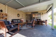 31A Clavering Rd Bayswater WA 6053 $589,000 Quietly tucked away, this surprisingly spacious 5 x 2 will delight on a 520 m block with its own driveway. You'll find a lot to love with an open plan living space, high ceilings and large windows, you'll be able to be all inclusive whilst entertaining with the living space opening out onto a great size, easy care alfresco area complete with spa! The gorgeously appointed kitchen features Caesar Stone benchtops and a large island bench cupboards that truly makes the kitchen the heart of the home, not to mention floor to ceiling cupboards and a 5-burner stainless steel gas cooktop and oven, so you'll be ready to cook up a storm! Other features include: - A barbecue deck and large paved alfresco area - Shoppers entry from the double lock up garage - Split system air-conditioning units in the main living space and master bedroom - Large main bedroom with separate ensuite, double vanities and a good size shower plus WIR - Bed 2, 3, 4 are generous with large mirrored robes - Instantaneous gas and a great hot water system - 600mm ceramic porcelain tiles throughout the living area and hall - Roller blinds on all windows - Large walk in linen cupboard - Large garden bed, easy care lawn with a number of fruit trees..