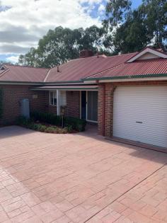 1/30 Lawson Street Wodonga VIC 3690 Perfectly positioned in a quiet pocket of town sits this 2-bedroom b/veneer townhouse, on its own title, being the front of two on the block. Fabulous investment, or a great entry point into the market, solid in construction, spacious, and with plenty of scope to further improve if you so desire. Generous throughout with an open plan lounge and dining area, great kitchen with gas cooking and good storage. The two very spacious bedrooms are serviced by a neat and tidy bathroom with full bath plus separate shower. Gas heating and a wall air conditioner provides your comfort, whilst outside there is a courtyard area, inbuilt BBQ, lock up storage shed, and undercover car accommodation. A great investment or move in and call home.