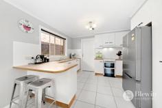 12/60 Jacaranda Drive Jerrabomberra NSW 2619 Located within a quiet complex you will find this spacious and light-filled two bedroom town house with separate living areas that has been recently refreshed. As you enter the home you are led into the large lounge room that opens onto the private light-filled atrium. Continuing down the hall is the open plan kitchen and family room which opens out to the rear private entertaining area and gardens. The kitchen boasts great cupboard and bench space along with easy access to the large laundry and all overlooking the family and entertaining area. Both of the generous sized bedrooms offer built-in robes and easy access to the large bathroom with shower, separate bath and substantial vanity. To ensure your comfort year round there is ducted gas heating plus an air conditioning unit in the family room as well as ceiling fans the living areas and bedrooms. This neat property has also been freshly repainted and had new carpet and curtains installed. Adding to all of this is the double garage with remote roller door and internal access for ease and security. Features: – Large light-filled lounge room – Open plan kitchen and family room – Both bedrooms with built-in robes – Private rear garden with entertaining area – Private light-filled atrium – New carpet and curtains throughout – Freshly repainted – Ducted gas heating – Air conditioning unit – Double garage with internal access – Quiet complex within easy walking distance to local shops and primary school..