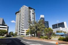 182/41 Chandler Street Belconnen ACT 2617 $445,000+ ***Although restrictions have lifted please remember COVID-19 guideline rules. It is requested that attendees sign in using Check in CBR app with the displayed QR code at this property. Social distancing is to be respected.*** This fantastic 2 bedroom apartment is situated on the 11th floor in the sought after Altitude complex! You'll be sitting pretty in this stylish apartment with so many amenities at your doorstep. The spacious & sunny open plan living area, well-designed kitchen with dishwasher, electric cooktop and ample bench space and neutral decor throughout will be sure to please. The sweeping views can be enjoyed from the living area and from your private balcony. Each of the bedrooms are spacious in size. The complex features an outdoor heated pool, a fully equipped gymnasium, and BBQ facilities overlooking Lake Ginninderra for truly resort-style living. Centrally located in the heart of Belconnen, with many popular cafes, restaurants, shops and scenic walking paths and recreational areas around Lake Ginninderra all nearby. Close to several Government departments, schools and the Canberra City Centre only a short drive away this apartment offers a fantastic urban lifestyle. Quality features include: 2 bedroom apartment Built in robe to main bedroom Built in cupboards to 2nd bedroom European style laundry with dryer Stylish kitchen with ample bench space and additional stainless steel dishwasher Covered entertaining balcony Gym, heated outdoor swimming pool and common areas Prime location..