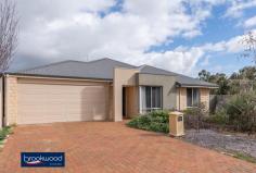 11 Minora Way Jane Brook WA 6056 $540,000 A stylish and modern family home, cleverly orientated on its 632m2 corner block, with a layout that focuses on easy-living and the demands of busy family life. Advantageously located opposite Jane Brook Reserve, within easy reach of Midland, links to public transport and a choice of primary and secondary schools, this beautifully-presented, and very practical home is an ideal option for families needing space while maintaining access to services and amenities. • 4 bedrooms 2 bathrooms • 2012-built Redink home • Light, spacious open plan • Airy, 31-course ceilings • Fabulous cook’s kitchen • Large private master suite • Comfortable theatre room • Covered alfresco dining • 16 S panels, SHW + boost • Desirable 628m2 crn block • Opp Jane Brook Reserve At the heart of this comfortable home is a wonderful open plan kitchen/dining/family room. Large soft-toned tiles underpin the feeling of relaxed informality and a design that takes best advantage of the site brings light and create a seamless flow between indoors and out. The kitchen is a cook’s delight, a wide oven, 5-burner hob, dishwasher and ample bench and storage space are ideally arranged for daily meal prep or celebratory feasting. A scullery/laundry adjoining the kitchen provides additional prep space and built-in cabinetry and shelving make this an ideal room storing appliances and bulk-goods. A dining alcove is arranged to one side of the open plan zone to create an intimate area for formal dining. The size and location of the alcove mean it is perfectly placed to be used as a playroom for young children or study for teens. Sliding doors lead from the family room to the covered alfresco dining area and the tidy, fully-fenced back yard. Off the open plan living area is a cosy yet spacious theatre room, a great place to snuggle up with everyone and enjoy some quiet down-time. Designed for uninterrupted viewing, the privacy of this space allows it to be utilised as a functional guest room. The spacious and relaxing main suite is positioned toward the rear of the home – with double-glazing, a large walk-through wardrobe and a modern ensuite with separate W.C, there is a real sense of self-contained seclusion in this parents’ zone. Three large junior rooms are arranged toward the front of the home along with the family bathroom. The home is fitted with 16 solar panels and benefits from boosted solar hot water. A 2-car garage is arranged at the front of the home to provide direct internal access. Jane Brook is well located for easy access to Midland and rail links to the Perth CBD, fast links to main arterial roads and an abundance of green space, National Parks, sporting facilities and the gourmet delights of the Swan Valley. To arrange an inspection of this property or to receive exceptional service delivered with relaxed confidence call Brad Williams today on 0408 887 375.