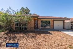 45 Inquirer Lane Stratton WA 6056 $329,000 What a find for first home buyers and downsizers. This 4-bedroom, 2-bathroom brick and tile home sits hidden on a winding lane and overlooking a grove of tall jacarandas. Set well back from the road with a fully fenced back yard offers extensive space for outdoor living, a lawn, and a small garden shed. • 4 bedrooms 2 bathrooms • 1995-built brick and tile • Formal & informal living • Good sized jnr bedrooms • Open plan kitchen/family • Carport with roller door • Separate dining/activity • Extensive outdoor living • 451 sqm fully fenced lot • Hidden in a green glade Not only does this home deliver a flexible floor plan, good sized bedrooms and ample space for outdoor living, but the delightful setting also overlooks a stand of tall jacarandas with their seasonal display of purple exuberance and lush green canopy. An elevated position well back from the road adds to the sense of seclusion; it’s hard to believe schools, local shops, transport, and the Midlands CBD are mere minutes away. The front door opens into a formal lounge with reverse cycle air conditioning. This quiet, carpeted space is ideal for curling up with a book or enjoying uninterrupted screen time. Opposite the lounge is the good-sized main bedroom featuring built-in robes and an ensuite with shower, vanity and W.C. A central open plan kitchen/family room flows seamlessly to a south-facing verandah and decked gazebo to allow for effortless indoor-outdoor living. A U-shaped bench with an integrated breakfast bar and under bench storage delineates the well-designed kitchen. A cutaway wall creates a partial separation between the kitchen/family room and a formal dining room or activity space. This air-conditioned, multi-purpose room leads to the junior wing where three good sized bedrooms, two with robe recesses, share the family bathroom and a separate W.C. located off the walk-through laundry. A decked gazebo overlooks a small lawn and wide verandah in the fully fenced backyard, allowing ample space for entertaining or relaxing. A small garden shed sits in the far corner of the yard. The memorable setting, private backyard and sense of space create a delightful feeling that you have left the world behind. Yet, the convenient Stratton address puts shops, schools, public transport, and the Perth Hills’ outdoor adventures on your doorstep. To arrange an inspection of this property or for the best advice, the best service and the best solutions call Ken Wiggins on 0403 012 950.
