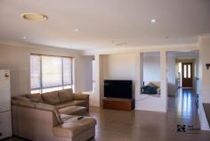 16 Bell St Denman NSW 2328 $430,000-00 Modern and spacious four-bedroom family home with large undercover outdoor entertainment areas •Attractive contemporary design rendered façade with street appeal •Overlooking farmland quiet and scenic location •All bedrooms with built in robes & ceiling fans •Master bedroom with walk in robe and ensuite •Elegant main bathroom and separate toilet •Separate lounge/theatre room •Spacious open plan tiled family / dining area •Well appointed kitchen with loads of cupboard space, walk in pantry, and S/Steel appliances •Ducted rev/cycle air/cond, solar hot water, down lights and ceilings fans through out •Great undercover outdoor entertainment areas # Tiled alfresco area, # wrap around undercover paved areas •Double garage with internal access electric doors and drive through access to back yard •Fully fence yard..