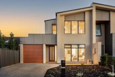  57 Glen Lossie Street Woodville South SA 5011 $700,000 to $770,000 Enjoying a fabulous position among the prestigious ‘Glens’ of Woodville South, this brand new two-storey home is superb from start to finish. It’s the little luxuries that make this Torrens Title build townhome when it comes to selection. A huge ground floor master bedroom suite is easily accessible from the extra wide entry, where its northerly aspect welcomes a constant soaking of natural light, and a large walk-in robe and Spotted Gum dual-vanity ensuite bathroom add extra comfort. Created for entertaining, the open plan kitchen, living and dining is well-lit, inviting and intricate. A stunning American Oak topped waterfall island adds warmth to the sleek white cabinetry and textured tile splash back that will have any home chef itching to get into this kitchen. Complete with Bosch stainless steel appliances including a 900mm gas cooktop, wall oven and dishwasher, butler’s pantry, breakfast bar and wealth of storage. The living space with feature gas wood log fire will be the place to be as winter approaches, while dual sets of sliding doors allow for easy access to a hardwood rear decked alfresco and side courtyard with lawn. Head up the Tasmanian Oak staircase and you’ll be pleasantly surprised by the size of a second living space or kids’ retreat, as well as a further three bedrooms including huge front double with built-in robes that would happily convert to a home office or third living space. Serviced by a large family bathroom with bath and shower, along with full-height storage to the passage that is sure to come in handy. Delight in the details: – Solid 19mm timber floors upstairs – Huge wraparound understair storage – Double length carport – Ducted reverse cycle air conditioning – Spacious laundry + third w/c to ground floor – Walk-in robes to bedrooms 3 & 4 Just over 10-minutes to the CBD, with commutes made easy via train and bus transport. Schools, shops, hotels, reserves and the sea – they’re all within easy reach here. Quality and total comfort, this one will be hard to resist. 