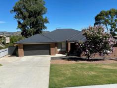 11 Warwick Road Wodonga VIC 3690 Quality built by Southern Vale homes, this 5 years young double storey family home, is positioned on a low maintenance 770m2 allotment, in a highly sought after elevated location. Perfectly designed to suit the block to capture the stunning views and outlook on offer from many vantage points. Beautifully appointed throughout and offering four bedrooms, all three minor bedrooms with built in robes, whilst the main offers a wonderful outlook, a beautiful well appointed and spacious ensuite with large shower, and large walk in robe. The large light filled open plan meals/living area offers plenty of space and a wonderful outlook to the surrounding countryside, whilst the beautifully appointed and spacious kitchen is the feature of the home, offering an abundance of bench and storage space, a walk in pantry, feature highlight window, s/steel appliances, pendant lighting and a huge island bench. Directly off the kitchen area is the fabulous tiled alfresco entertaining area with ceiling fan, a great place to sit and relax and enjoy the wonderful outlook on offer. The modern family bathroom services the 2 minor bedrooms and offers a full bath, shower and vanity. The walk in linen cupboard to the top level offers good storage, heating and cooling is ducted throughout offering you year round comfort, and the home also offers double glazing, and floating floors to the upstairs living area. Downstairs there is a fabulous rumpus room/2nd living area with split system heating and cooling, this leads out to a concreted 2nd entertaining area, adjacent to this room is the spacious laundry with good storage. and plumbing points in place for the easy addition of a 3rd toilet, shower and basin if needed. Car accommodation is via the extra large double garage which also allows easy internal access into the home. Twin side access gates allow easy access to a concreted driveway which leads down to the back yard, this area adds scope for further storage if needed. Low maintenance landscaping to the front of the home, whilst the rear yard is also completely landscaped, and offers plenty of room for the kids to play or animals to roam. If you are wanting a modern and low maintenance family home in a great location, then 11 Warwick Road will be well worthy of your inspection.