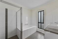 2 Brealey Place Naracoorte SA 5271 With a neutral decor, this immaculately presented town home, sits on a low maintenance block of 431m2, within a 10 minute walk to the town centre. Offering 3 queen size bedrooms, all with built-in robes. Central bathroom with a full length bath & shower, with the toilet separate. Open kitchen/dining, with spacious bench areas, a dishwasher, pantry, split system air-conditioning and electric appliances. The living area is off the wide entrance hallway. Single car garage under the main roof and the laundry offers outside access & good space. There is also a paved, undercover outdoor living area. Rainwater is plumbed to the toilet, kitchen sink & dishwasher. This home is spacious, inviting and rare to find. For the investor buyer the property is currently tenanted at $305/week until 09/11/21.