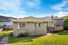 13 Douglas Drive Bridgewater TAS 7030 $325,000 If you are looking for an affordable first home or investment property, you will not find better. This brick, low maintenance home offers exceptional water and mountain views and is awaiting its lucky new owner. The home has recently been freshly repainted, with new carpets , floor coverings and curtains. Immaculately presented and ready to move in and enjoy. Three good size bedrooms, two with built-ins, neat kitchen and bathroom, separate laundry, wood heater and a great backyard for the kids to play. Situated in a high demand area for tenants with a rental appraisal of approximately $400.00 per week, this would be a set and forget investment opportunity. Minutes drive to major services, transportation and local schools. First home buyers - take advantage of the stamp duty concessions on this affordable property.