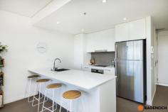182/41 Chandler Street Belconnen ACT 2617 $445,000+ ***Although restrictions have lifted please remember COVID-19 guideline rules. It is requested that attendees sign in using Check in CBR app with the displayed QR code at this property. Social distancing is to be respected.*** This fantastic 2 bedroom apartment is situated on the 11th floor in the sought after Altitude complex! You'll be sitting pretty in this stylish apartment with so many amenities at your doorstep. The spacious & sunny open plan living area, well-designed kitchen with dishwasher, electric cooktop and ample bench space and neutral decor throughout will be sure to please. The sweeping views can be enjoyed from the living area and from your private balcony. Each of the bedrooms are spacious in size. The complex features an outdoor heated pool, a fully equipped gymnasium, and BBQ facilities overlooking Lake Ginninderra for truly resort-style living. Centrally located in the heart of Belconnen, with many popular cafes, restaurants, shops and scenic walking paths and recreational areas around Lake Ginninderra all nearby. Close to several Government departments, schools and the Canberra City Centre only a short drive away this apartment offers a fantastic urban lifestyle. Quality features include: 2 bedroom apartment Built in robe to main bedroom Built in cupboards to 2nd bedroom European style laundry with dryer Stylish kitchen with ample bench space and additional stainless steel dishwasher Covered entertaining balcony Gym, heated outdoor swimming pool and common areas Prime location..
