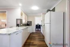 71 MacDonald Drive Armidale NSW 2350 $360,000 to $395,000 Feel right at home from the moment you step into the fresh and light-filled interior of this family home. A modern charmer, it blends cottage-style cosiness with expansive living space for busy families. A smart layout delivers both a lounge room and a sitting room and ensures that everyone has a place where they can blissfully retreat or come together to enjoy one another's company. The renovated kitchen is white and bright, with a walk-in pantry and electric appliances for cooking up a storm, and is conveniently located between the dining area inside and the north-facing covered alfresco area outside. The three sizable bedrooms enjoy plush new carpet, and built-in robes along with ceiling fans and are serviced by a sleek modern bathroom with a freestanding tub, shower and storage vanity with dual basins. Air-conditioning and a lock-up garage await as well, car access to back yard, while the level 771m2 block is fully fenced in the back; what you do with it is yours to decide. Enviably located only two minutes from Ben Venue School and the Phil Wheaton Oval, you'll also appreciate the proximity to local shops, cafes, and necessities. Rear access to a bike track that takes you all the way to UNE. Arrange your inspection today. *We have obtained all information in this document from sources we believe to be reliable; however, we cannot guarantee its accuracy. Prospective purchasers are advised to carry out their own investigations.*