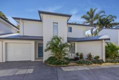 2/48 BROKEN BAY ROAD ETTALONG BEACH NSW 2257 Introducing this impeccable 3 bedroom townhouse, 4 years young and set in a friendly, quiet and 100% owner-occupied complex only 2 minutes’ walk to the water’s edge. Leave the everyday bustle behind and be welcomed by beautifully maintained gardens and a private, thoughtfully designed space offering an array of impressive features. Downstairs boasts relaxed open plan living and dining which flows effortlessly out to a paved patio with retractable shade cover, and a landscaped courtyard and garden. You’ll also find a large double bedroom with built-in robe and en suite complete with bathtub. Upstairs features an additional 2 double bedrooms, one with walk-in robe and mountain views, a two way bathroom and a convenient second living / study area. Further highlights include: - Plantation shutters, roller blinds and tinted windows throughout for privacy and a modern, coastal feel - Ducted reverse cycle air conditioning and ceiling fans for year round comfort - Hardwood timber stairs and LED lighting - Remote single garage with laundry and internal access - Plenty of storage upstairs and downstairs - 3rd toilet / powder room downstairs for guests - Pet-friendly complex - Strata $544 and rates $266 per quarter - A short, level walk to the waterfront, shops, cafes, restaurants and cinema - 5 minute drive to Umina surf beach and Woy Woy CBD and train station..
