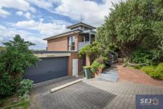 43 Oceanview Parade Sandy Point VIC 3959 $775,000 Set on approx. 726m2 in a quiet court just a two minute walk to the cafe, tennis courts and main beach access track, this multi level home is crowned by a tower that offers sensational views in every direction - over the tree tops to the coastline and distant hills. Built to last with character and quality evident throughout, there is something for everyone and space to share! Expansive open plan living / dining room adjoins generous well appointed kitchen, large enough to accommodate several keen cooks at once! Downstairs family room with built in bar. Games room that fits a pool table with room to spare. 3 fitted bedrooms, 2 family sized bathrooms, huge fitted laundry, storage area for wetsuits and beach equipment, cellar, double LU garage with direct access. Drive through to securely fenced north facing rear garden with a LU shed. Big enough to enjoy full time or perfect as your own private escape. Being sold fully furnished and ready to continue with holiday bookings in this popular coastal township surrounded by pristine waterways.