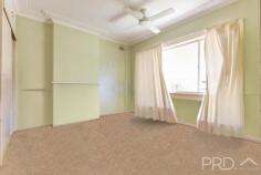 22 Clarke Street Tumut NSW 2720 $289,000 Boasting a surprisingly large floorplan and conveniently located in a quiet cul-de-sac, you will love the options available with this larger style floor plan, with the ability to move straight in whilst you contemplate that dream renovation. Do not miss your opportunity to secure a great home with excellent potential, call today and book your inspection! Premiere Features: - Three bedrooms, large master with built in robes, dresser and ceiling fan - Bathroom with combined shower and bath and single vanity - Quaint kitchen positioned in the heart of the home with electric cooktop and good storage - Open plan dining area with polished timber flooring with split system air conditioning, built-in fire place and ceiling fan - Large semi formal lounge boasting timber flooring and ceiling fan - Internal laundry - Separate toilet positioned to the rear of the home - Formal entry and built-in linen - Quaint back verandah, fully covered - Single carport - Two rainwater tanks - Fully fenced 745m2 allotment - Additional garden shed - Great sized rear yard - Currently tenanted at $280 per week..