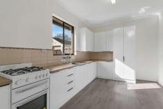 1/27 Fifth Avenue Ascot Park SA 5043 $415,000-$420,000 This three bedroom garden homette has been beautifully renovated and presents in immaculate condition - ready for its lucky new owners. Offering separate lounge, kitchen/dining plus three bedrooms, it's ideal for the young family start-ing out or a downsizer who doesn't want to compromise on space. The private north facing gar-den captures plenty of natural light to light up the sparkling modern interior. Inside, a welcoming lounge adjoins the combination kitchen/dining with sliding doors. Open up the space and entertain in style, or close off the living zones for an intimate evening in. New float-ing floors run throughout the living areas, lending the space a fresh modern feel. The dine in kitchen has been completely modernised by the current owners. It offers substantial storage and bench space plus gas cooktop and oven. The bathroom is in original condition, with considerable retro charm. There's scope to update if you prefer a modern look. Three bedrooms make this one a rare find indeed. They've been updated with quality new carpet, plus a mirrored built-in-robe and ceiling fan to the main bedroom and ample built-in-robe to the second. Step out to a charming front garden which also extends around the side. Privately fenced with lawn, blossom trees and garden borders, there's space for an outdoor setting, barbecue and even kids' play equipment in the tranquil space. Store the car or claim your private workshop with a large secure garage complete with automatic roller door. Set in prime position in a small group of three, this is a truly private home. There are no shared walls, with it's own garage and private fenced garden. The amazing location is an easy stroll from local shops and cafes, as well as Ascot Park railway station and local bus routes. Local shopping is nearby at Park Holme Shopping Centre, and Westfield Marion is just a few minutes' drive. Flinders University and Medical Centre are conven-ient, and Glenelg is only 10 minutes away. Want the space and privacy of a house without the upkeep? Call Scott Robinson today! What we love: · 285 sqm block (approx) · New kitchen · New flooring · New gas hot water · Ceiling fans and air conditioning · Substantial private gardens · No shared walls, with individual garages between each property · Prime position at the front of the small group..