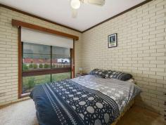 2 Watson Court Myrtleford VIC 3737 $520,000 Located in the peaceful surrounds of Watson Court and only a short stroll from the Myrtleford Golf Course and show grounds, is this split level 3 Bedroom double brick home on a great sized 887sqm block. Features include: - 3 Bedrooms all with built in robes and ceiling fans. - Fully renovated Bathroom with separate shower & bath. - Split Level living with kitchen, dining and living downstairs with wood heater. - Large timber kitchen with electric cooktop, oven and a dishwasher. - Second smaller lounge/rumpus room up stairs. - Large Laundry with plenty of storage. - Great outdoor undercover entertainment area with Pizza Oven/Fire place. - Large lockable garage with power and roller door, as well as a second toilet. - Carport with undercover front door access. - Wood shed, garden shed as well as vegetable gardens. Call our agents today to book an inspection. FEATURES: • Air Conditioning • Built-In Wardrobes • Close To Schools • Fireplace(S) • Formal Lounge • Garden • Secure Parking..