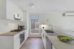 18 Macedonia Street Taperoo SA 5017 Minutes from the beach and North Haven Marina comes this delightful three bedroom home with all the trimmings. It has been completely renovated by the current owners and comes complete with new flooring and carpets. It's the ideal starter home or downsizer for buyers looking for a low maintenance lock-up-and-leave lifestyle. The great location is also sure to attract quality tenants, making this one a smart investment. From a central hallway, the home opens to a light flooded living and dining room at the rear. Floating timber floors lend the space a fresh airy feel, with split system air conditioning for climate comfort. It's overlooked by the modern kitchen with everything you'll need to whip up a feast. A gas stov-etop, stainless steel appliances, breakfast bar and ample storage make this the hub of the house. Open glass sliding doors to a generous and private back yard. Entertain under the crowd pleas-ing pergola. A central lawn and landscaped beds stand ready to welcome the next green thumb. All three bedrooms feature new carpets, with a walk-in-robe to the main and built-in-robe to the other two. There's a sparkling private en suite and a convenient three-way family bathroom, so there'll be no morning rush here! A convenient garage with electric roller door and internal access, plus additional driveway ac-cess, provides plenty of off street parking. You're just 700m from the beach, with parks, cafes and eateries alongside the charming marina. Taperoo railway station is an easy walk, and there are several schools in the area. Port Ade-laide's Fisherman's Markets are 10 minutes away, and Westfield West Lakes less than 15. This is a great little buy in a solid area with all the conveniences you could want. Call Scott Rob-inson to find out more. Offers subject to finance welcome. What we love: · Renovated three bedroom home · New flooring and carpets · Modern kitchen and bathrooms · En suite and WIR to main bedroom · BIR to remaining bedrooms · Additional built in storage throughout · Private garage with internal entry · Landscaped gardens · Private back yard with entertaining pergola · Walk to beach, railway station, local shops and schools.