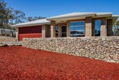 25 Hakea Cl Tallong NSW 2579 $890,000 - $940,000 DUE TO COVID-19 RESTRICTIONS ALL INSPECTIONS ARE BY APPOINTMENT ONLY A master built home with high end finishes and fit out generally only found in ones forever home. From the exceptionally wide entry door and hall quality is evident in every space, with 9ft ceilings, double glazing, Caesar stone benches in the kitchen and generous living spaces for the whole family to enjoy The centrally located kitchen offers a 900ml free standing oven / cook top, breakfast bar excellent storage and walk in pantry Purpose built home office off the main entry hall overlooking the front garden or potential 5th bedroom The media room is a great space and separate to main living Dining and living is open plan and flows to the outdoor terrace under roof Quality fit out to all wet areas plus a 3rd wc in the laundry Master suite is both generous in size and separate to the other beds + offers sliding doors to the rear terrace Ducted gas heating with add on cooling throughout perfect for all seasons 3 phase power connected, 170,000 litre water tank to the rear + gas tank on site for your heating and cooking options As far as landscaping the hard work has been done with stone retaining walls, various garden beds, sealed driveway and level pad at the rear awaiting the man shed or perfect for guest parking. An elevated 3 acres of land with distant local views and fully fenced boundary offering a nice mix of lawn and natural bush. Book your viewing today to see what this home and Tallong Park has to offer.