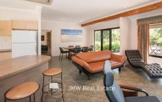 32 Kangaroo Parade Yallingup WA 6282 $1,300,000 to $1,400,000 Situated just a three minute drive from both Smiths and Yallingup beaches, this four bedroom, two bathroom, solar passive, brick and Colorbond home is tucked away on 2.7 acres of peppermint, banksia and redgum bushland. Just a short walk to Studio Bistro and Little Fish restaurants and a two minute drive to Yallingup General Store and Caves House Hotel. This versatile four bedroom home has an open plan living, kitchen, dining area with raised ceilings and a slow combustion wood heater. A generous separate lounge area has an open fireplace. All rooms have bushland outlooks. The living areas and main bedroom face north for winter sun and open out onto a freestanding alfresco area. The home also has a large games room/workshop accessed from the double garage or verandah. The succulent gardens are low maintenance. The bushland has stunning wildflowers in spring including orchids. The home has a fully reticulated vegetable garden and established fruit trees. Water for gardens is supplied by a bore. There is plenty of room for visitor’s cars, caravans and tents. If you are chasing a secluded home or holiday house on acreage close enough to the beach for a morning swim, surf check or evening sunset walk then this is the property for you. Additional Features: * 1.1022ha (approximately 2.7 acres) * 2 x split system air conditioners (living area and games room) * Solar hot water system with electric hot water booster * 13 panel solar system * Huge rain water tank * Bore with self-filling holding tank * 3 huge shade sails between house and freestanding alfresco area * 900mm rangehood, gas hotplate and 600mm oven * Large walk-in pantry * 2002 brick and Colorbond construction * Room to add sheds, granny flat or extensions (subject to approval) * Fenced vegetable gardens * Established fruit trees * Garden shed * Shade house For further information or to arrange inspection please contact your South West Sales Representative Ben Jecks on 0408 545 304 or ben@jmwrealestate.com.au