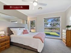 16 Pleasure Point Road Pleasure Point NSW 2172 Spilt level home minutes walk from waterfront reserve parkland and the Georges River. This beautiful property offers a multitude of formal and informal living zones that will suit the growing family looking for easy-care living and vast space. Not often are we given the opportunity to market such an immaculate property on approx. 929sqm in the Pleasure Point Estate. The gourmet gas kitchen is perfectly positioned in the heart of the home - overlooking the open-plan living and dining areas. It features extended stone bench tops serving as a breakfast bar with ample cupboard space and walk in pantry. Features include: - Modern Kitchen with butlers pantry, stone benchtops, gas cooking & quality appliances - Family area with gas fire place - Generous study/ work from home set up - Deluxe master suite with his & hers walk in robe and ensuite - 4 bedrooms with built in wardrobes - Separate Laundry - Alfresco area over looking inground pool with built in BBQ - Spacious 2 car lock up garage - Loads of storage throughout the home - Ducted air conditioning