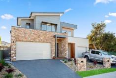30B Station Street East Corrimal NSW 2518 $1,200,000 - $1,300,000 Move right in to this stylish brand new duplex with dateless exterior, built to the highest standard with polished concrete and timber floors, fully covered alfresco area bathed in northern sun, low maintenance garden and minutes from East Corrimal beach or Corrimal Centre. Features: • Open plan living • Stylish mix of concrete and timber finishes • Poly and stone kitchen • Study • 3 bedrooms WIR and ensuite to main • Fully equipped laundry and separate WC downstairs..