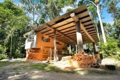 Lot 12 Oak Forest Road, Kuranda, QLD 4881 SUSTAINABLE OFF THE GRID IN STYLE WOW - If you are looking for something that allows your imagination to run wild, offers you a space to call home that is totally off the grid, private, functional & one of a kind - You will be very happy with this unique opportunity. This block is approximately 5.2 acres, totally tucked away and has loads of improvements is an understatement. A solid structure that offers living & sleeping areas 2 Sheds Solar power 2 Rainwater tanks Edible gardens So much more To view this property for sale in Kuranda contact the agent for more information and a private inspection. Ray White Smithfield Unit 8, 2-4 Stanton Road Smithfield, QLD 4878 +61 (7) 4038 9200