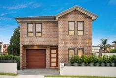 24B Smalls Road Ryde NSW 2112 $1,800,000 Ideally positioned just footsteps to Smalls Road Public School, this flawlessly presented duplex offers modern interiors, ample space and privacy. Its house-sized proportions creates a family-friendly atmosphere and an easy-care way of life. A secure, fenced garden provides safety for young children and pets to play together, combined with a north-facing alfresco ideal for entertaining or relaxing in the sunshine. Situated between Top Ryde City and Macquarie Park, the home also is within close proximity to Yamble Reserve, Midway shops, regular city transport and leading schools. - Immaculately presented throughout, street access from Neville Street - Spacious living areas connect with easy-care gardens and level lawns - Gas kitchen with Smeg appliances, 40mm stone bench and breakfast bar - Powerful and quiet ROBAM rangehood removes odour from the kitchen - Master suite includes bespoke walk-in-robes and a lavish ensuite - Main bathroom has a rainwater shower head, oval bath, luxe tiles - Prestige finishes throughout, tall shadow line ceilings, custom lighting - Zoned ducted air-conditioning, alarm system, plenty of storage