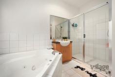 35 John Liston Dr Newport VIC 3015 $1,150,000 - $1,250,000 The entertainer’s delight Entertaining will be a dream in this sleek, large 3-bedroom family home located in the highly sought-after Williamstown Junction. You’ll be toasty warm from the moment you walk in with the gas log heater welcoming you into the large front lounge room which includes French doors that open out to the front courtyard. Follow the stunning timber floors, past the peaceful sounds of a waterfall in the enchanting atrium, to the spacious living area. A huge modern kitchen with a motherload of cupboard space and walk in pantry, includes stainless steel Miele appliances and a large Caesarstone island bench just itching for entertaining. Your dinner guests can relax in here or wander out to the huge alfresco wooden decking area, covered and fitted with its own bar heating and cafe blinds, offers enjoyment all year round. Head upstairs and you’ll find two good sized bedrooms with BIRs, one with a split system, both sharing a large bathroom with shower, toilet and bath as well as the light filled master bedroom with a walk-in robe, split system and ensuite with spa bath, shower and toilet. Fling open the French doors each morning to greet the sun from your very own petite balcony or just enjoy the views of the park across the road. As if all that is not enough, this house features ducted heating throughout, along with three split systems and evaporative cooling keeping it comfortable all year round, and Bose speakers with surround sound just ready for your amp to be plugged in. A large rear access double garage and, wait for it, ladder leading to a massive loft with oodles of storage space to hide away everything that comes with family living are just the icing on the cake. Situated minutes walking distance from the bustling Newport shops and cafes, 10 minutes from schools and 7 minutes to Newport train station - you couldn’t be closer to the action. The only problem you’ll have is where to sit peacefully with your glass of red, cheese and crackers - the lounge? The atrium? The deck? The balcony? The choice is yours... Features: • Spacious modern kitchen with Miele appliances • Large indoor/outdoor decking • Built in BBQ with rotisserie • Two bedrooms with BIRs • Master bedroom includes ensuite with spa bath and WIR • Atrium with water feature • Separate spacious laundry • Gas log and ducted heating • Split systems and evaporative cooling • Low maintenance outdoor spaces • Double garage with huge loft storage space • Lush green park, playground and tennis court across the road • Walking distance to shops, train station and schools..