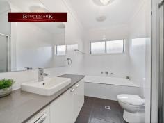 16 Pleasure Point Road Pleasure Point NSW 2172 Spilt level home minutes walk from waterfront reserve parkland and the Georges River. This beautiful property offers a multitude of formal and informal living zones that will suit the growing family looking for easy-care living and vast space. Not often are we given the opportunity to market such an immaculate property on approx. 929sqm in the Pleasure Point Estate. The gourmet gas kitchen is perfectly positioned in the heart of the home - overlooking the open-plan living and dining areas. It features extended stone bench tops serving as a breakfast bar with ample cupboard space and walk in pantry. Features include: - Modern Kitchen with butlers pantry, stone benchtops, gas cooking & quality appliances - Family area with gas fire place - Generous study/ work from home set up - Deluxe master suite with his & hers walk in robe and ensuite - 4 bedrooms with built in wardrobes - Separate Laundry - Alfresco area over looking inground pool with built in BBQ - Spacious 2 car lock up garage - Loads of storage throughout the home - Ducted air conditioning